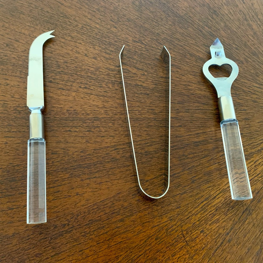 Party Tool Set - by Toscany
Cheese Knife, bottle opener and tongs